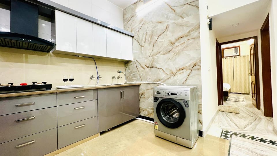 Kitchen or kitchenette, washing machine