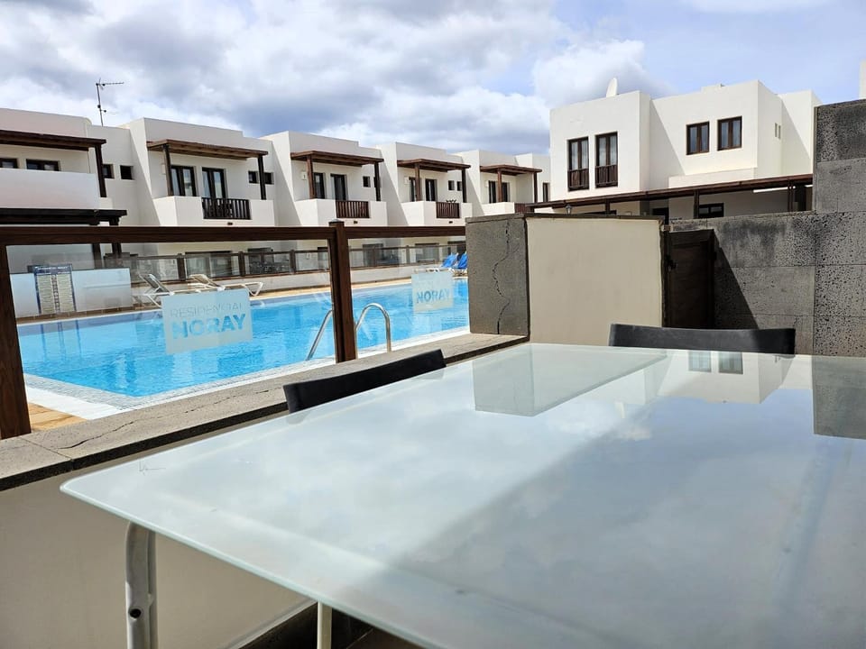 Balcony/Terrace, Dining area, Pool view, Swimming pool