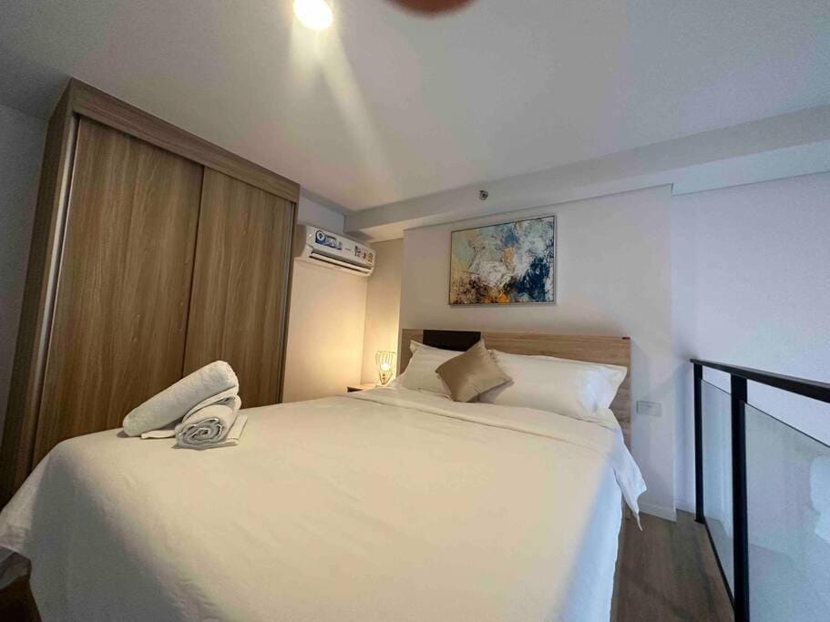 S87 新房Ramada Sukhumvit BTS 1bed Gym swimming Wifi Apartment in Bangkok