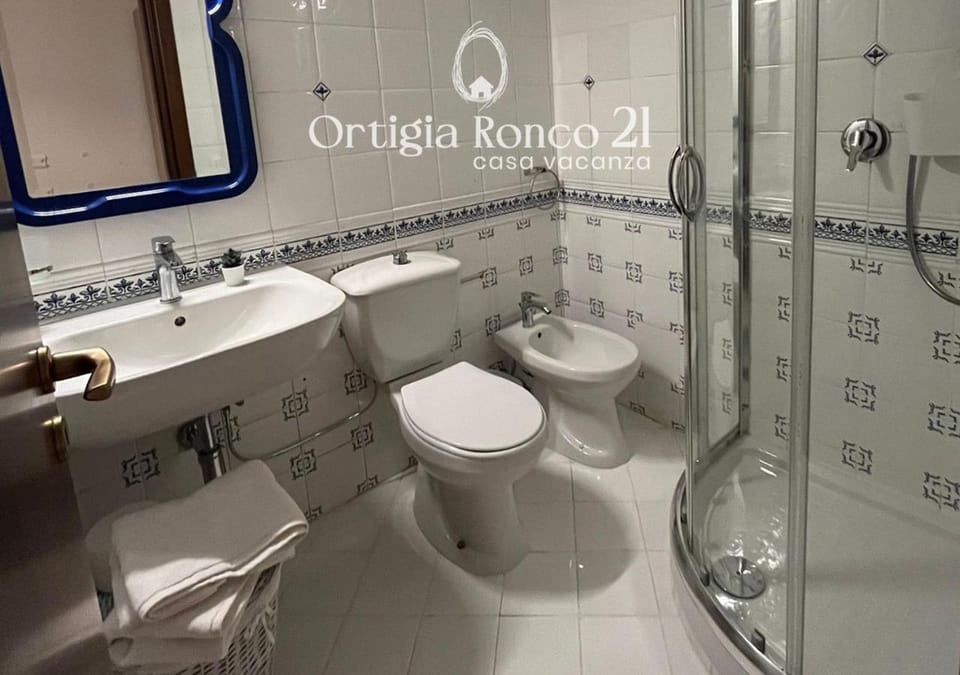 Shower, Toilet, Bathroom, bidet, hair dryier, towels