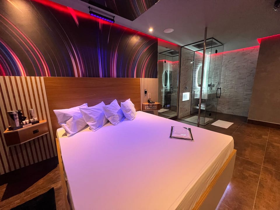 Shower, Bed, towels, air conditioner