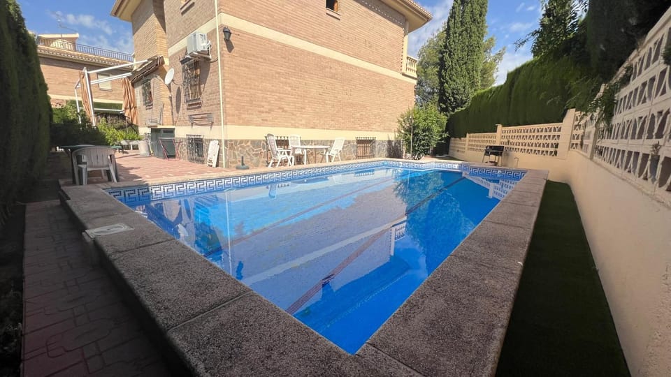Property building, Day, Pool view, Swimming pool, sunbed