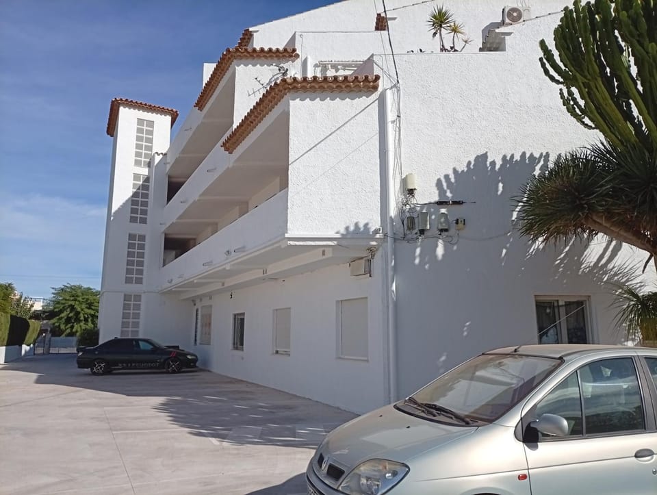 Property building, Day, Parking