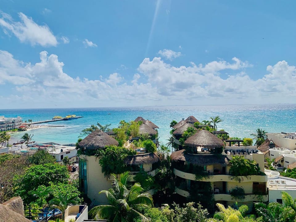 Property building, Nearby landmark, Day, Natural landscape, Bird's eye view, Beach, City view, Sea view