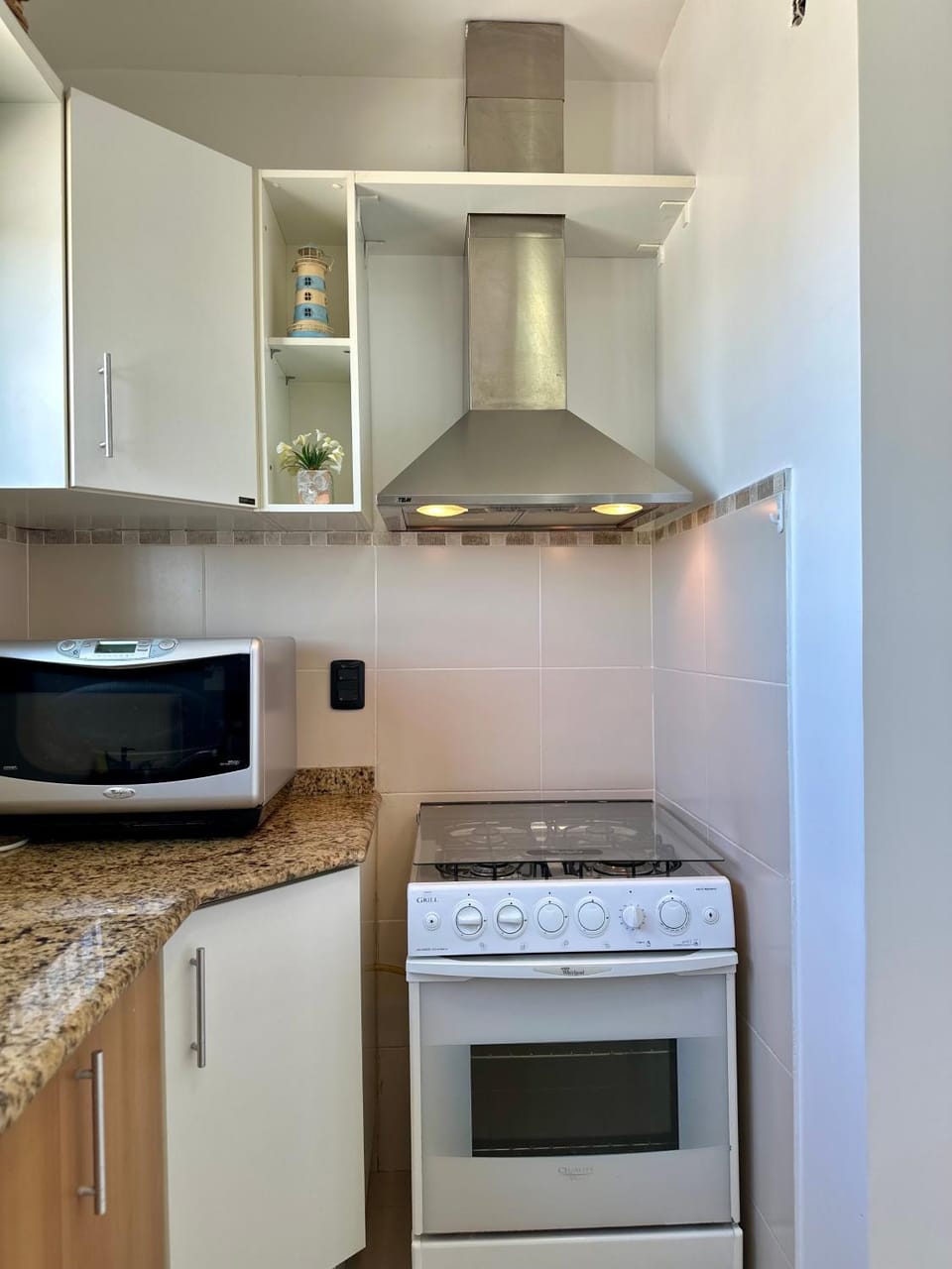 Kitchen or kitchenette, oven, stove