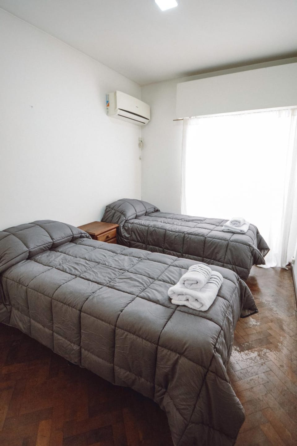 Bed, Photo of the whole room, Bedroom, towels, air conditioner