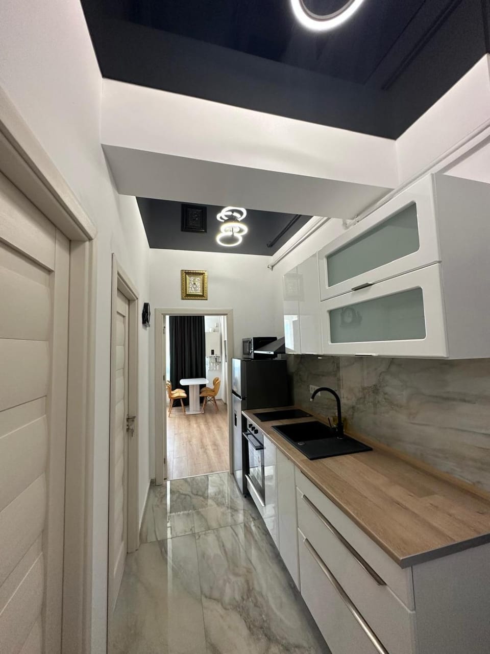Kitchen or kitchenette, oven, stove