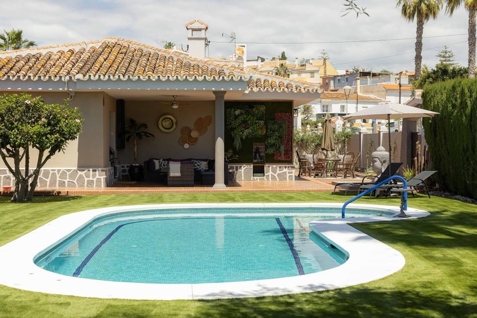 Property building, Living room, Swimming pool