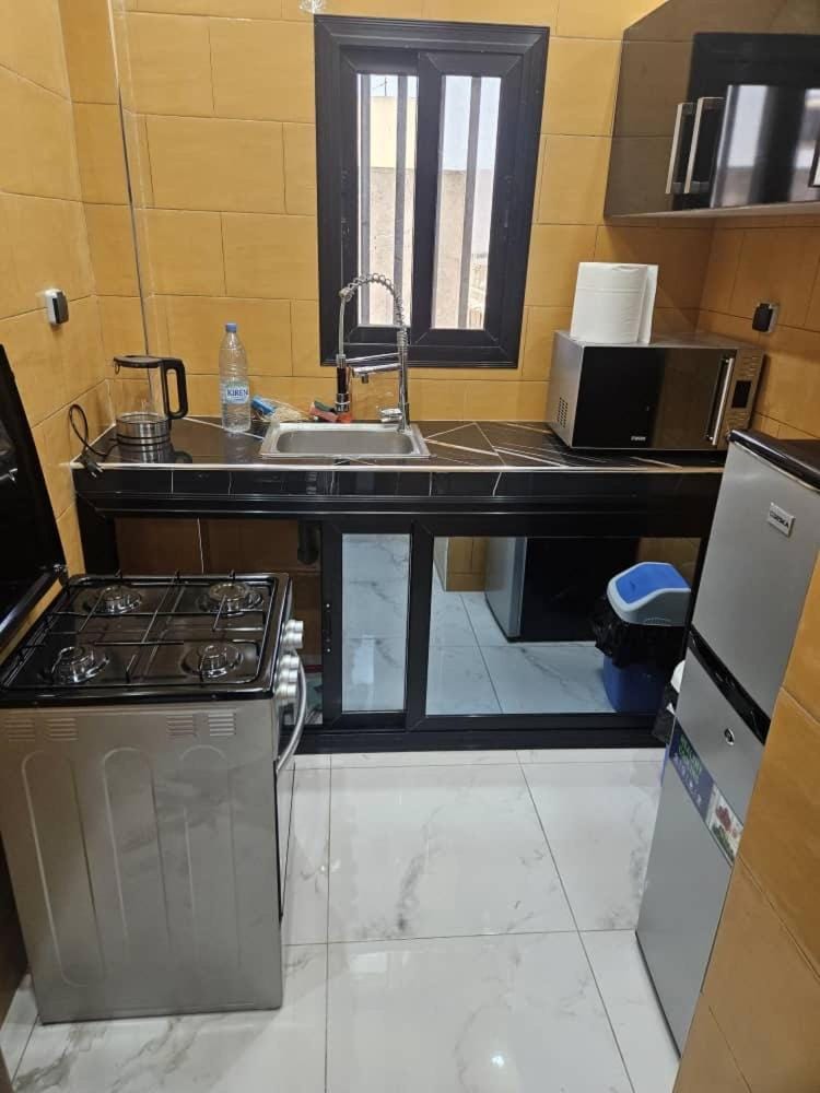 Studio meublé Dakar Sénégal, Chambre , salon , toilette et cuisine séparés Apartment in Dakar