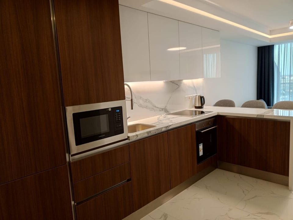 Kitchen or kitchenette, oven