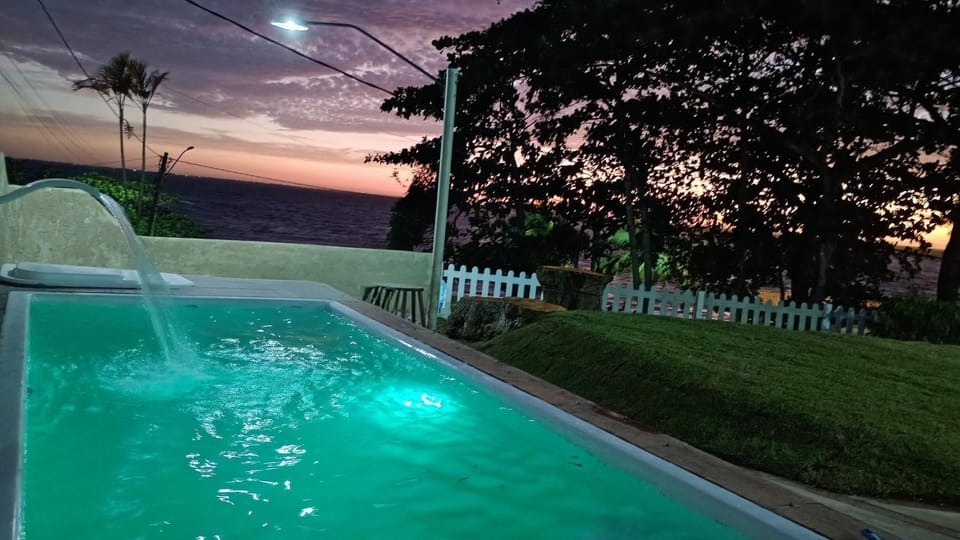 Casa 4 quartos, 2 suítes, piscina e acessibilidade - Frente para a lagoa House in São Pedro da Aldeia