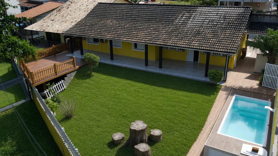 Casa 4 quartos, 2 suítes, piscina e acessibilidade - Frente para a lagoa House in São Pedro da Aldeia