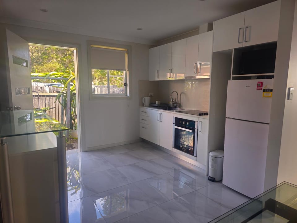 Kitchen or kitchenette, oven, stove