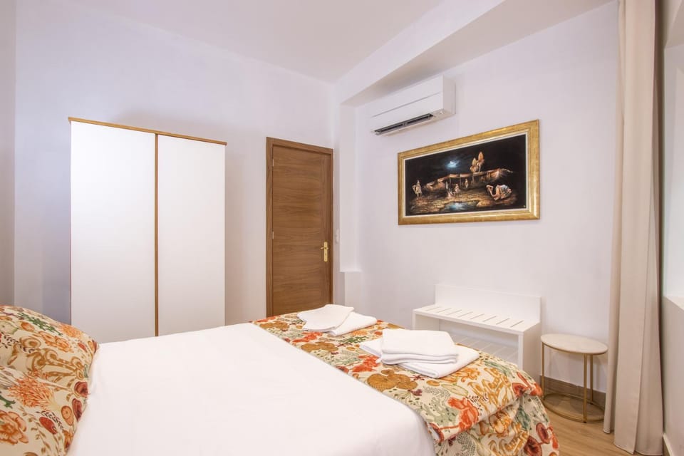Bed, Bedroom, towels, wardrobe, air conditioner