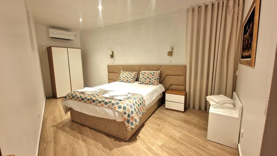 Bed, Photo of the whole room, Bedroom, cot, towels, wardrobe, air conditioner