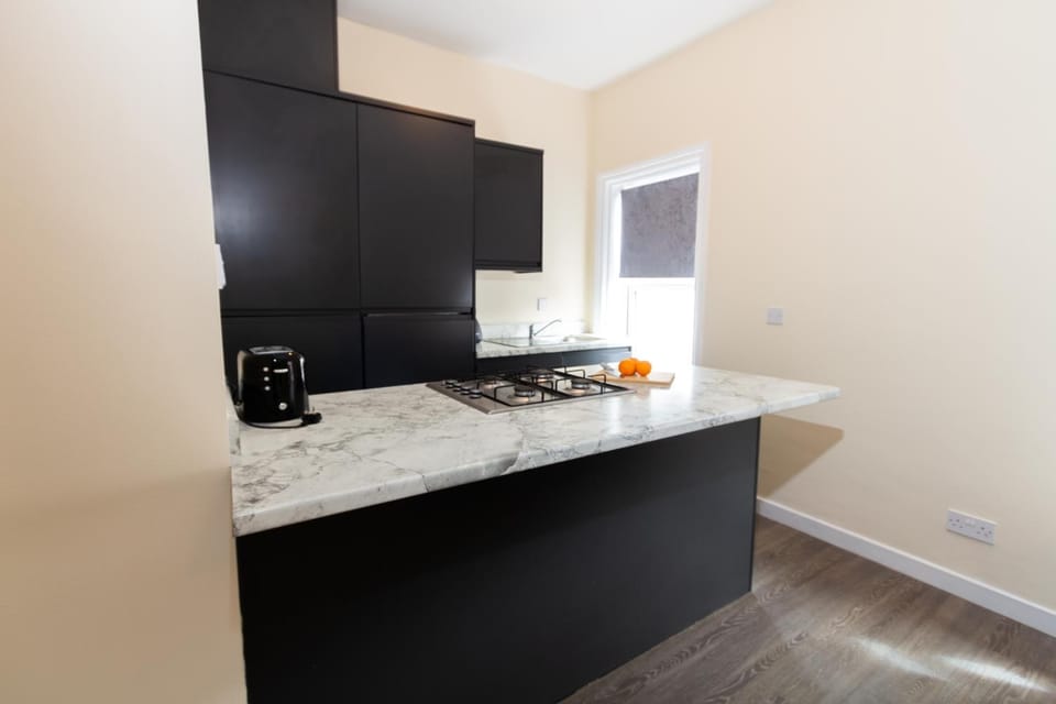 Kitchen or kitchenette, stove