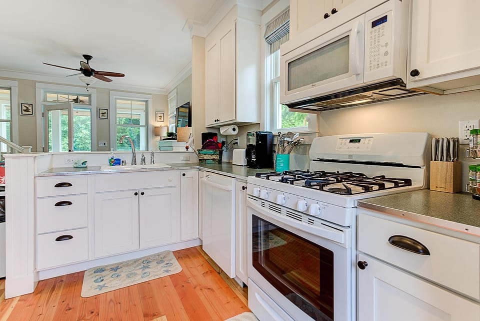 Kitchen or kitchenette, dishwasher, oven, stove, toaster