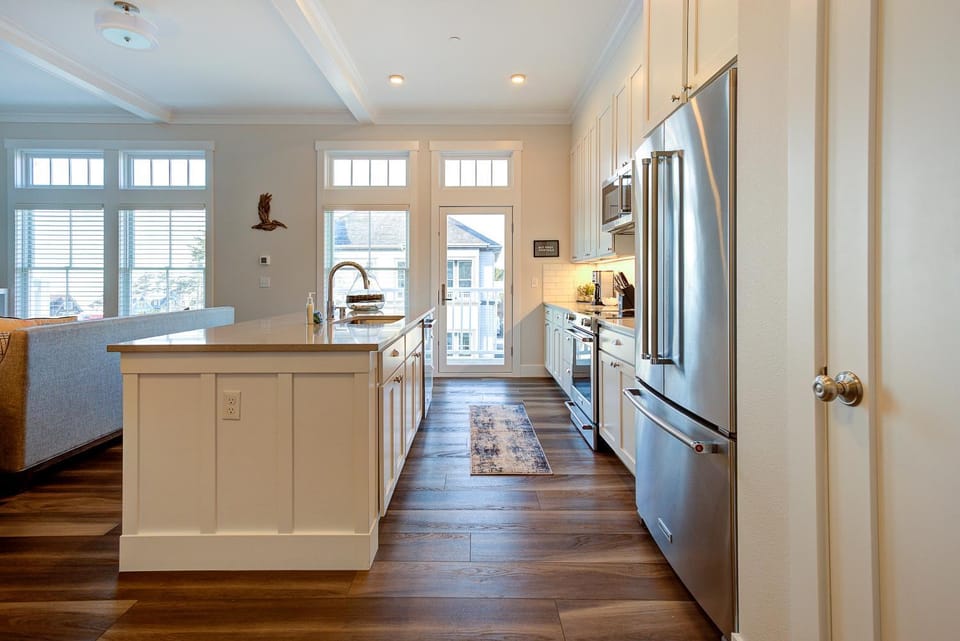 Kitchen or kitchenette, dishwasher, oven, stove