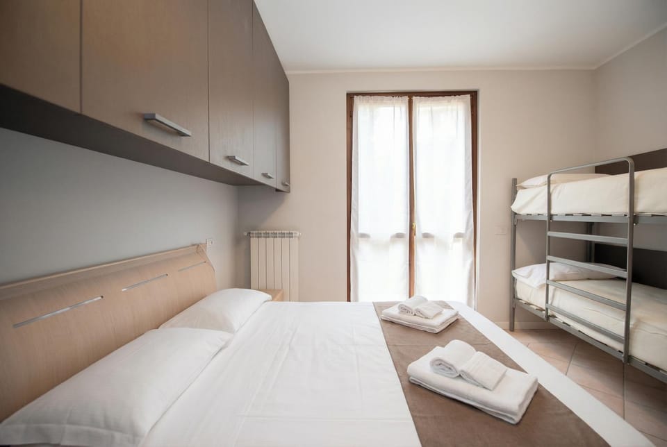 Bed, Photo of the whole room, Bedroom, bunk bed, towels, wardrobe, air conditioner