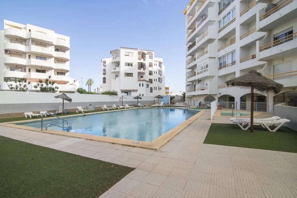 Property building, Living room, Swimming pool