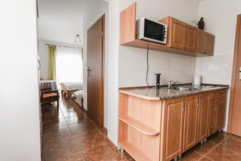 Kitchen or kitchenette, stove