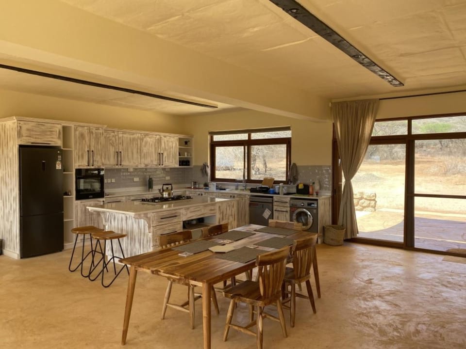 Kitchen or kitchenette, dishwasher, oven, stove