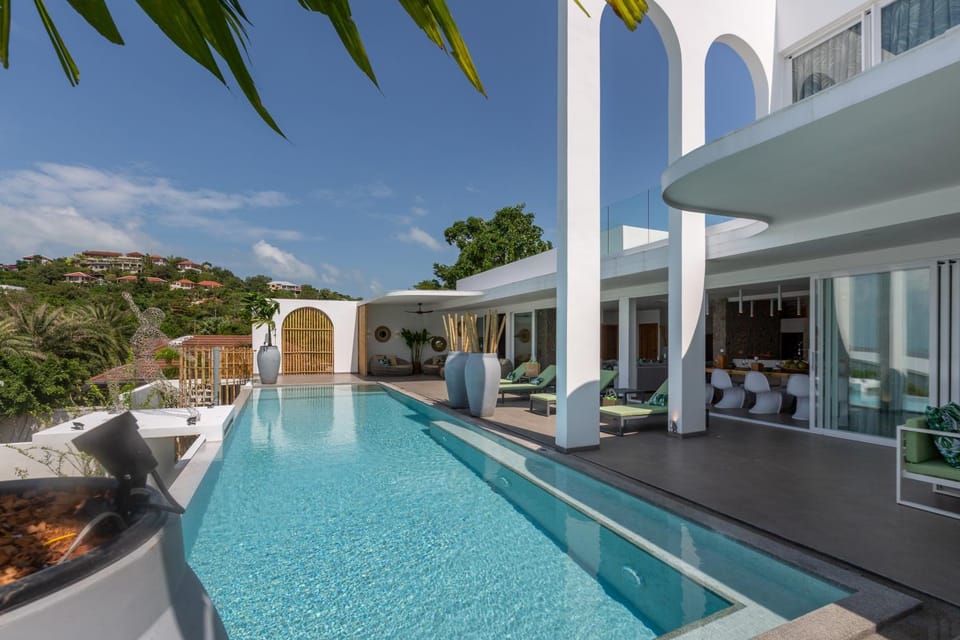 Property building, Patio, Day, Natural landscape, Pool view, Swimming pool, sunbed