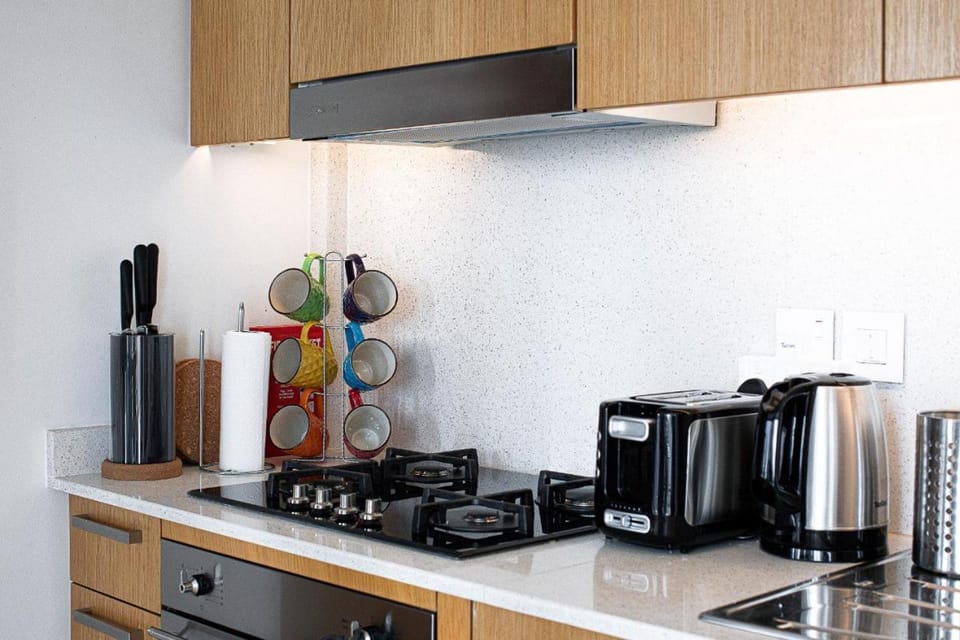Kitchen or kitchenette, stove, toaster