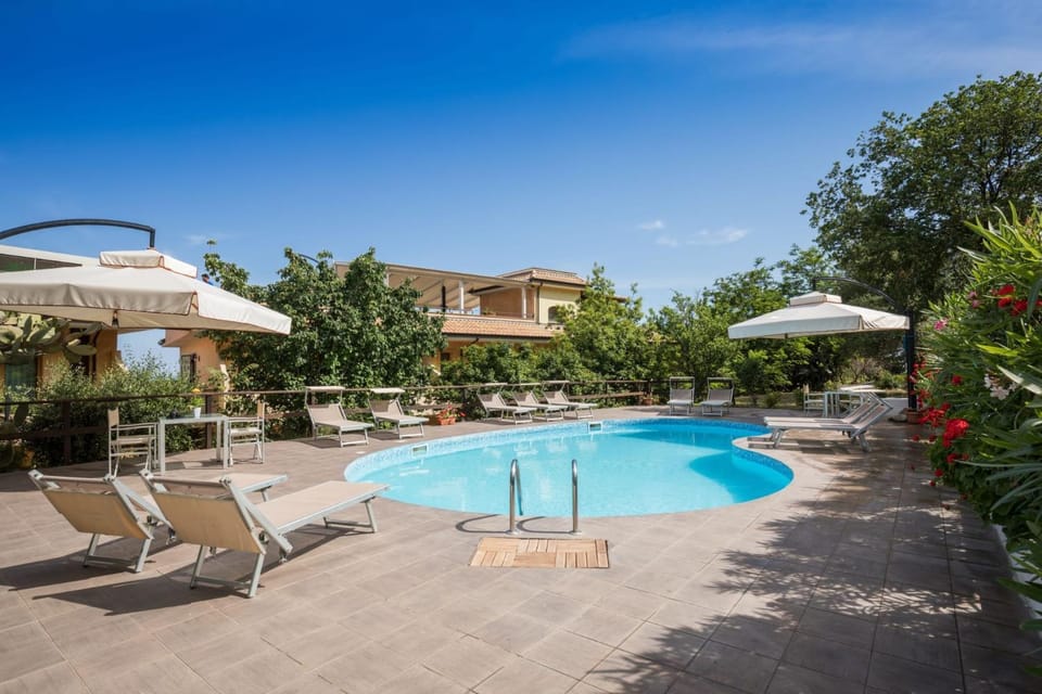 Property building, Patio, Spring, Day, Garden, Garden, Balcony/Terrace, Garden view, Pool view, Swimming pool