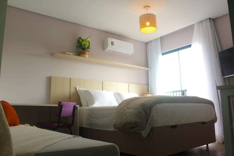 Bed, TV and multimedia, Living room, Photo of the whole room, Seating area, Bedroom