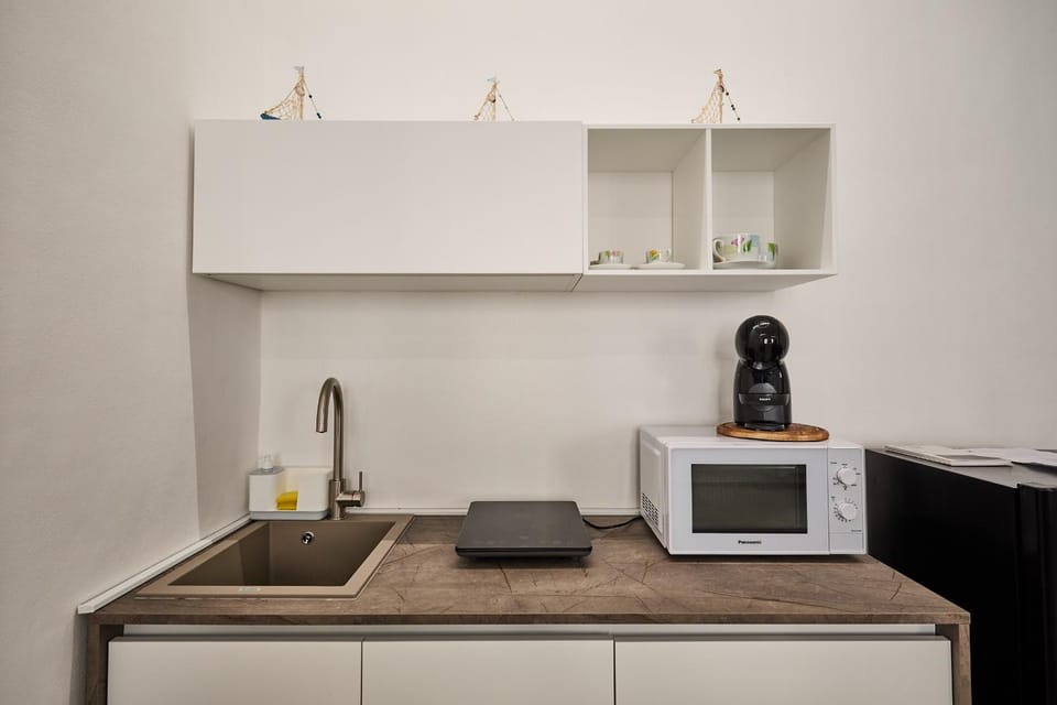 Kitchen or kitchenette, stove