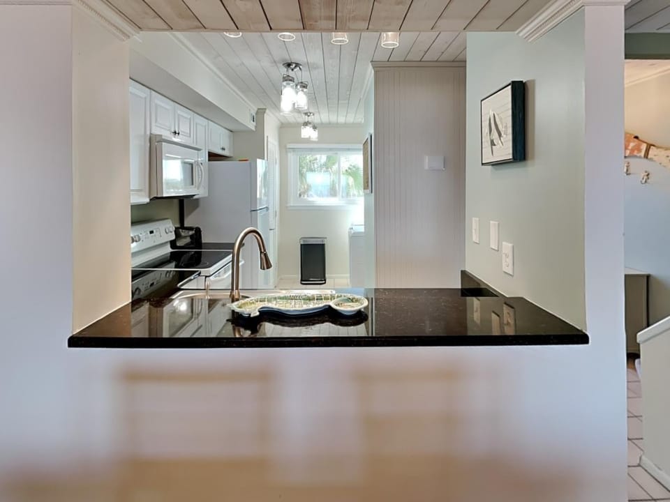Kitchen or kitchenette, furniture, microwave, kitchen