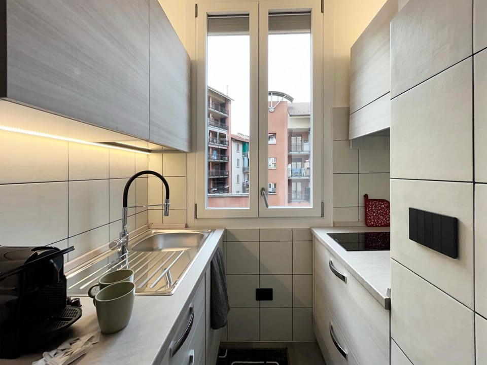 Kitchen or kitchenette, dishwasher, oven, stove, dryer