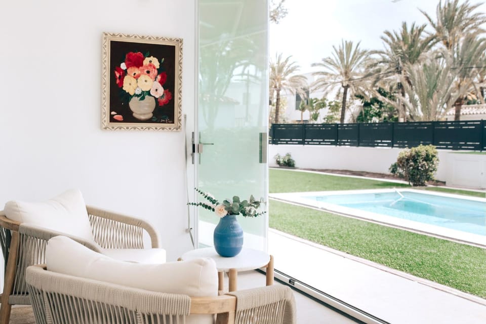Patio, Living room, Seating area, Pool view
