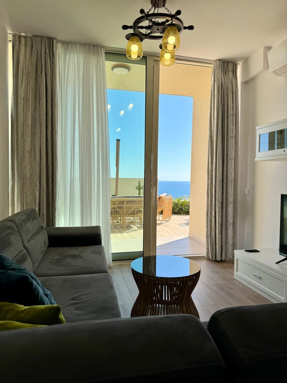 View (from property/room), Living room, Seating area, Sea view