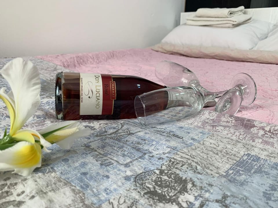 Bed, Food and drinks, Bedroom, Drinks, Alcoholic drinks