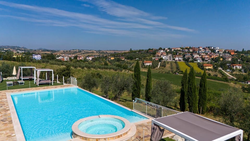 Property building, Day, Natural landscape, Pool view, sunbed