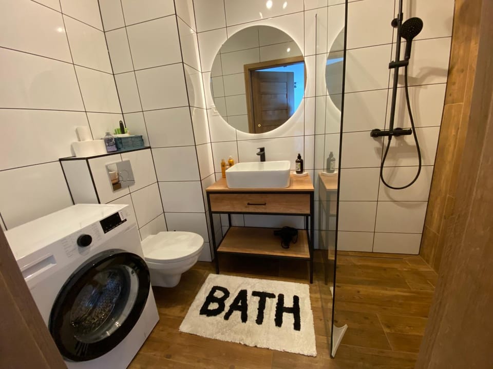 Shower, Toilet, Bathroom, towels, washing machine, dryer