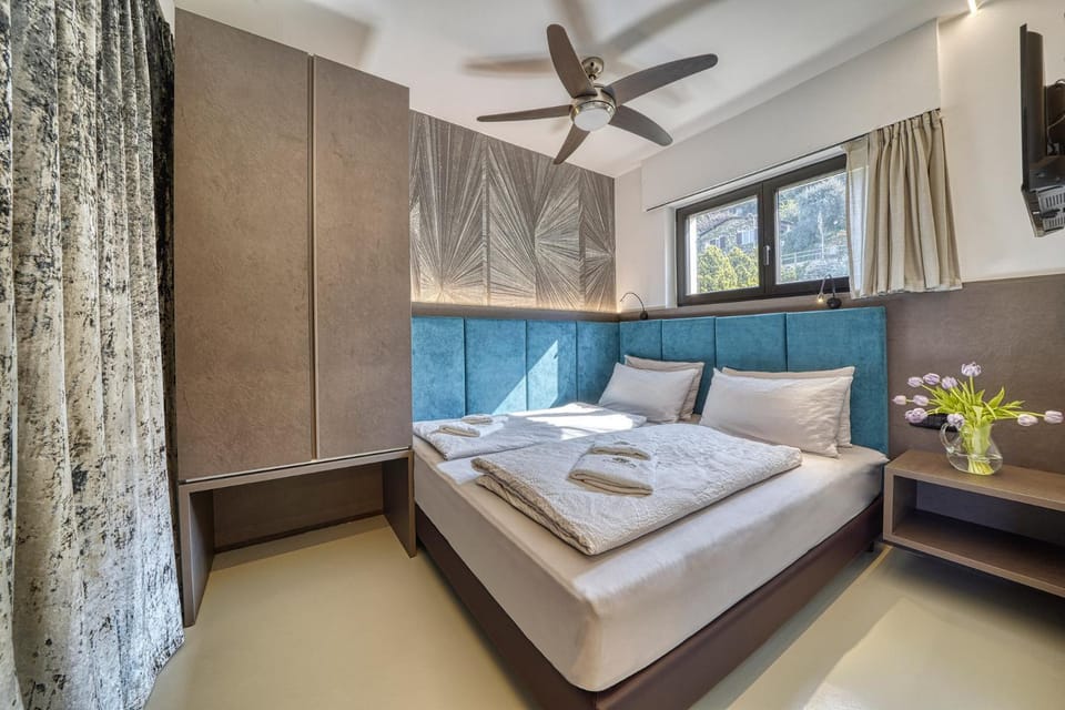 Bed, Photo of the whole room, Bedroom, towels, air conditioner, air conditioner