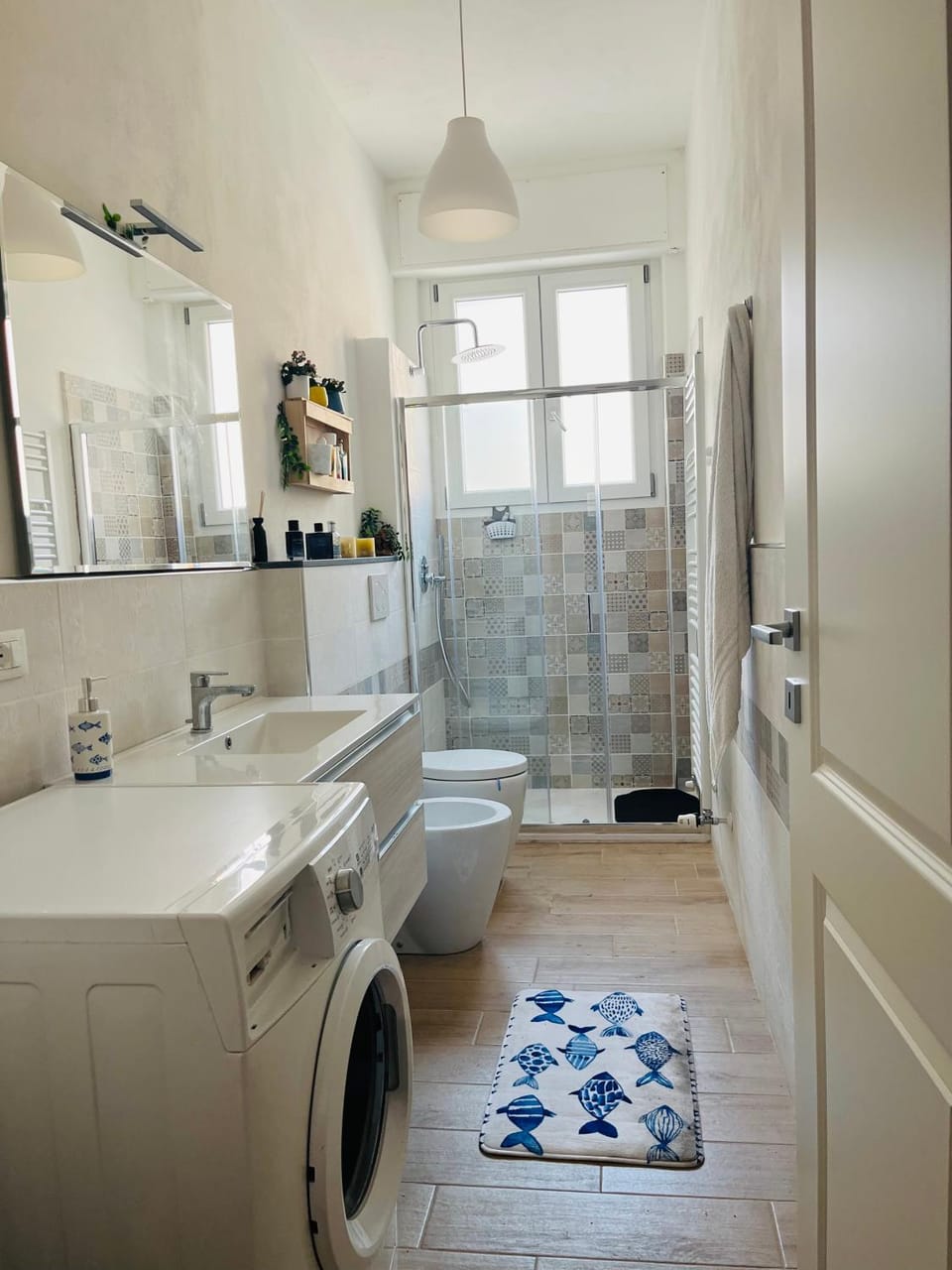 Shower, Toilet, Bathroom, bidet, towels, washing machine