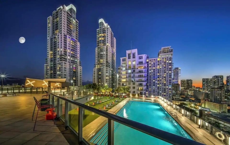 Property building, Night, View (from property/room), Balcony/Terrace, City view, Pool view, Swimming pool