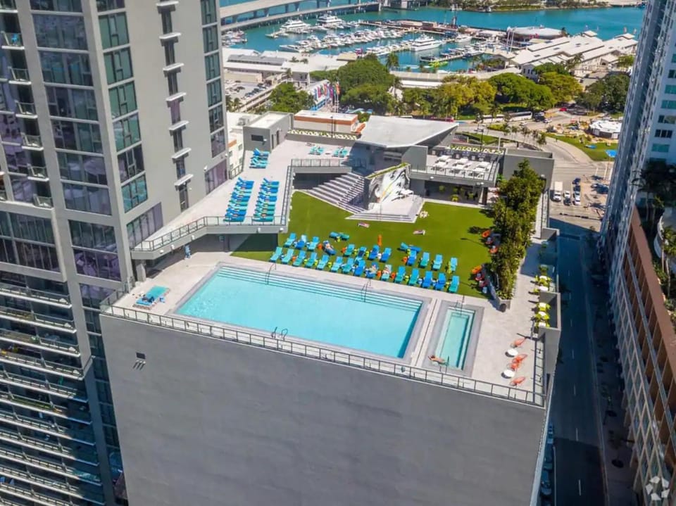 Property building, Day, Landmark view, Pool view, Swimming pool, Location, sunbed