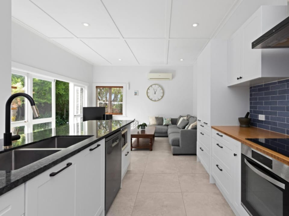 Kitchen or kitchenette, dishwasher, oven, stove