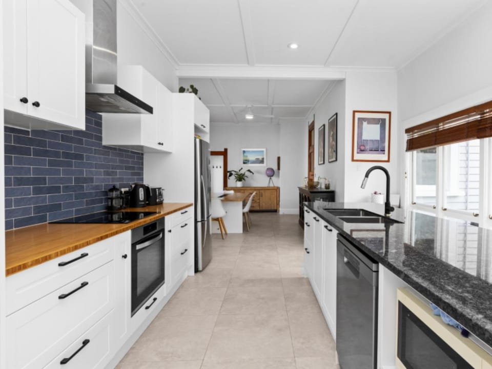 Kitchen or kitchenette, dishwasher, oven, stove, toaster