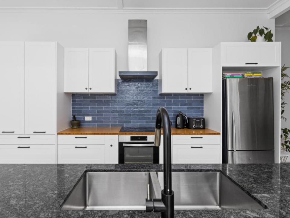Kitchen or kitchenette, oven, stove, toaster