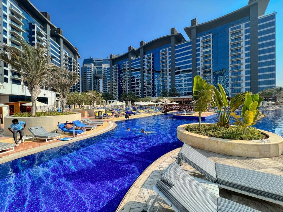 Property building, Pool view, Swimming pool, sunbed
