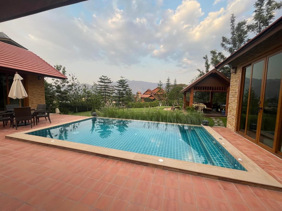 Property building, Natural landscape, Mountain view, Pool view, Swimming pool