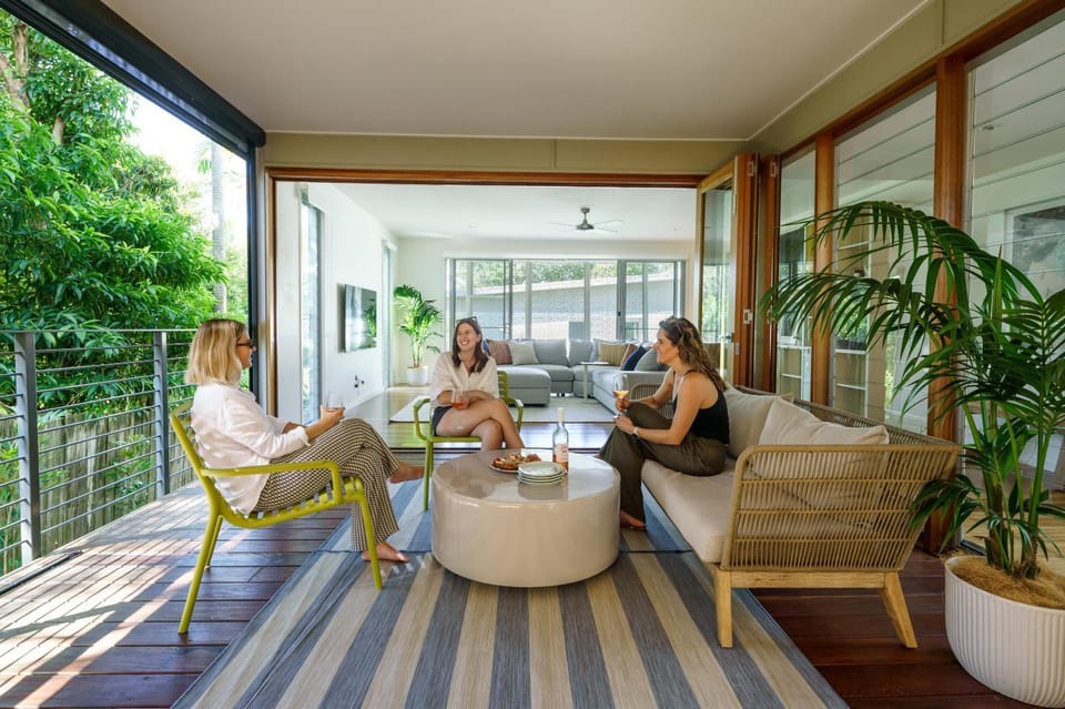 Patio, People, View (from property/room), Balcony/Terrace, Living room, Seating area, group of guests