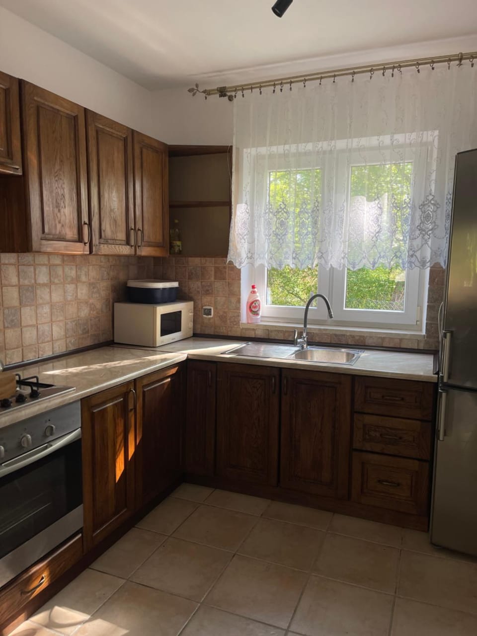 Kitchen or kitchenette, oven, stove