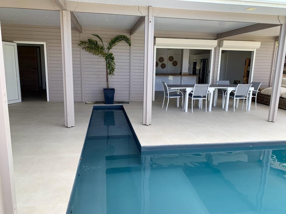 Patio, Day, Dining area, Pool view, Swimming pool